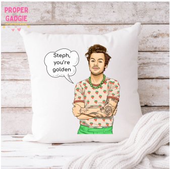 A personalized cushion featuring Harry Styles, customized with a fan's name or message, adding a unique touch to home decor