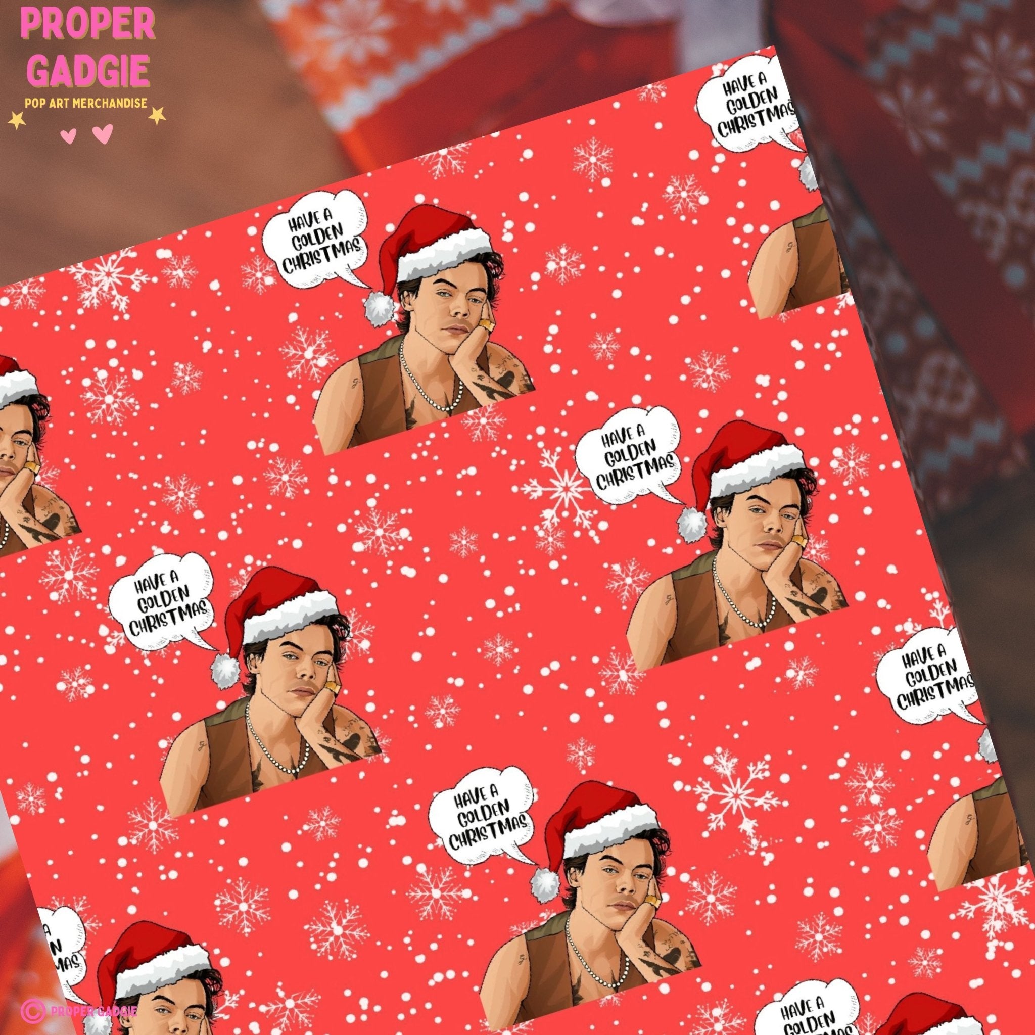 A festive Harry Styles-themed Christmas gift wrap adorned with holiday decorations and Harry Styles signature style